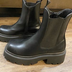 Black booties never worn!